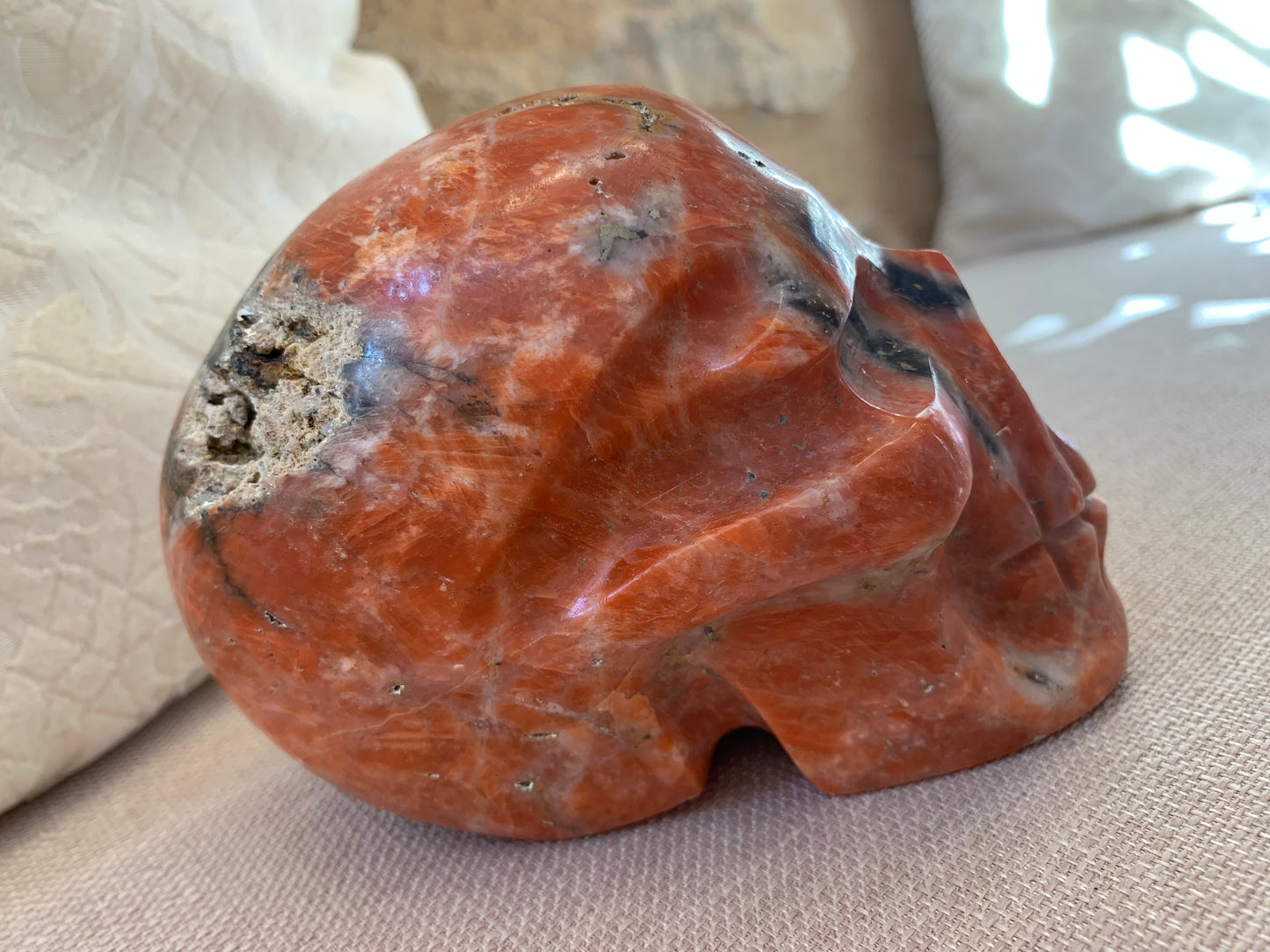 Crâne de cristal en calcite orange