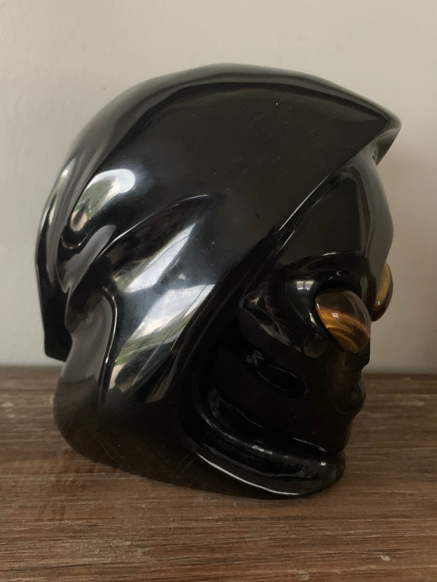 Crane de cristal stellaire en obsidienne noire et oeil de tigre
