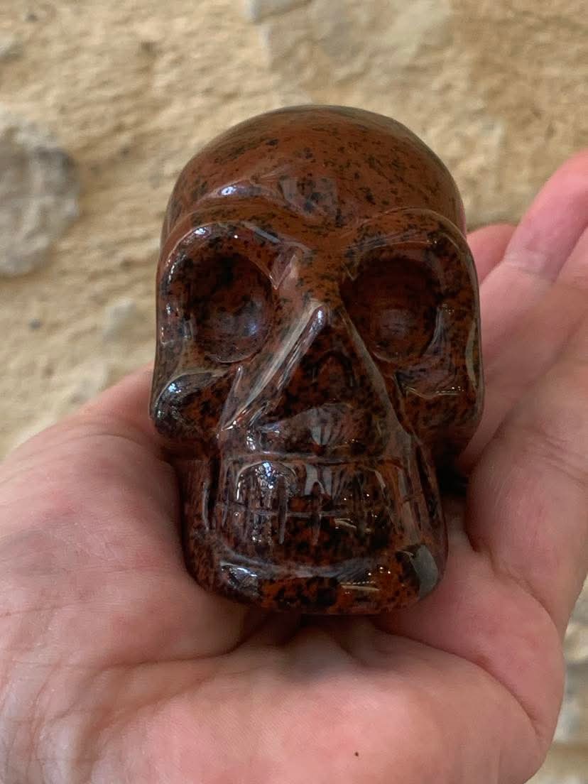 Crâne de cristal en obsidienne acajou