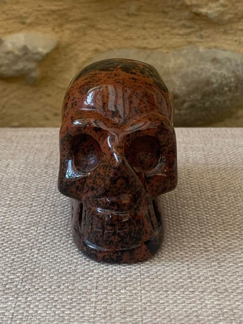 Crâne de cristal en obsidienne acajou