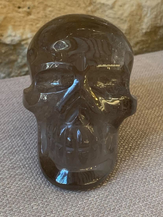 Crâne de cristal en quartz fumé