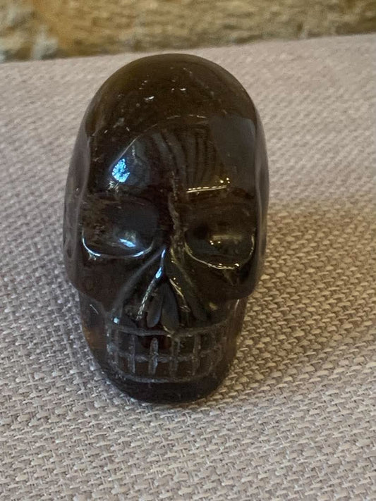 Crâne de cristal en quartz fumé