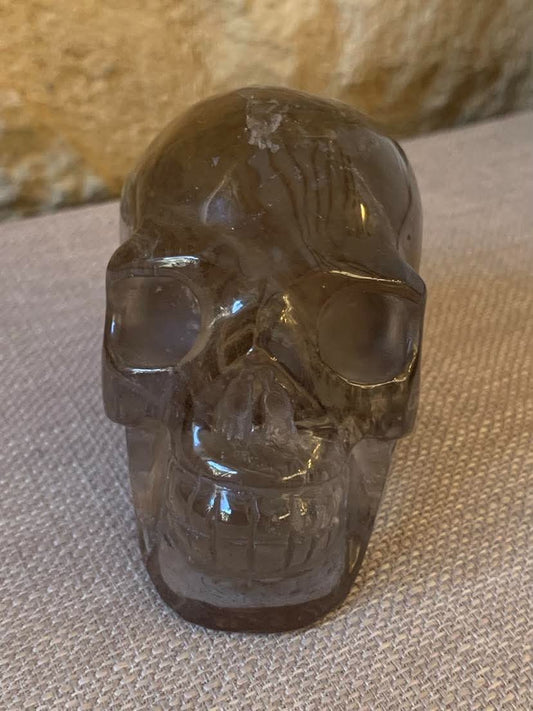 Crâne de cristal en quartz fumé