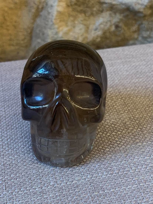 Crâne de cristal en quartz fumé