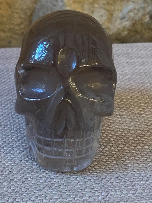 Crâne de cristal en quartz fumé