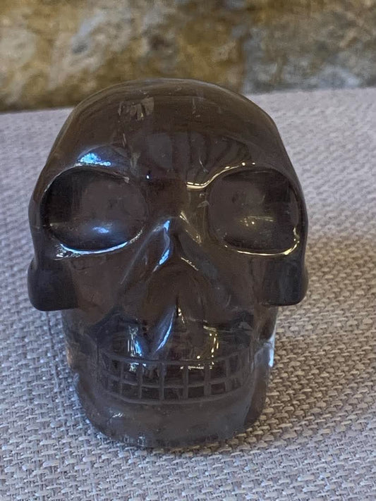 Crâne de cristal en quartz fumé